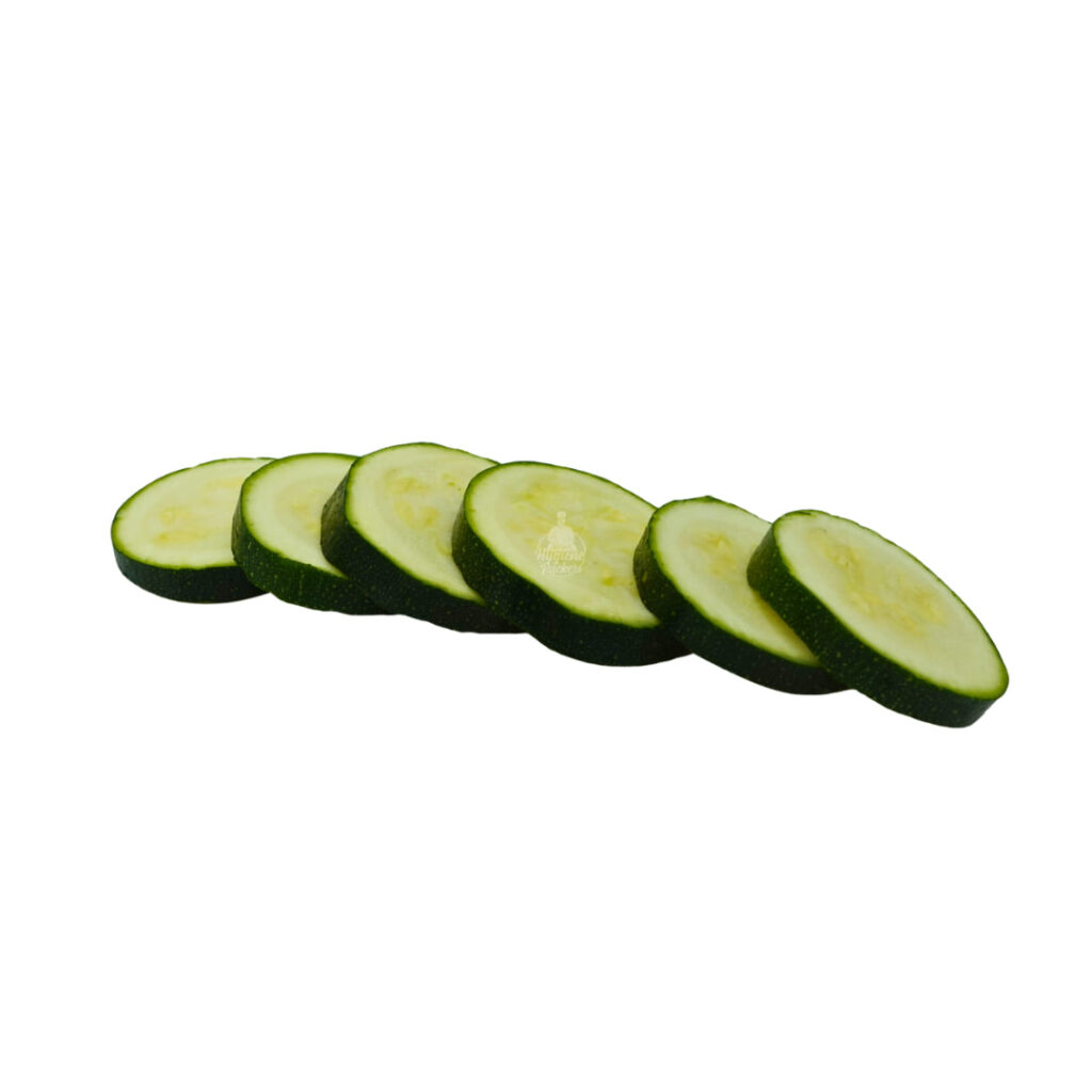 Sliced zucchini on white background